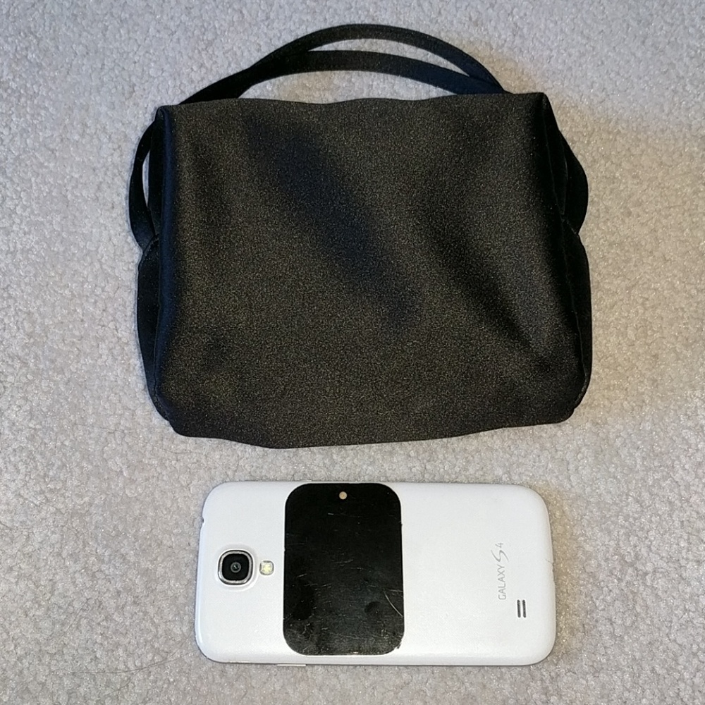 Satin evening bag by Indeed